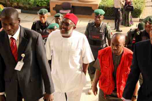 Olisa Metuh arrival for his first trial day all smiles